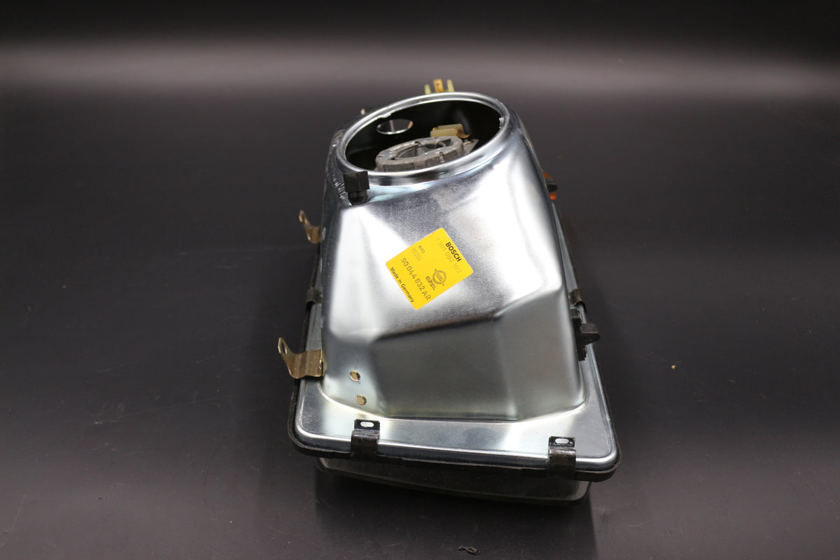 Hauptscheinwerfer rechts H4 Opel Rekord E1 OE 1216242 90044632 Bosch 0301062102