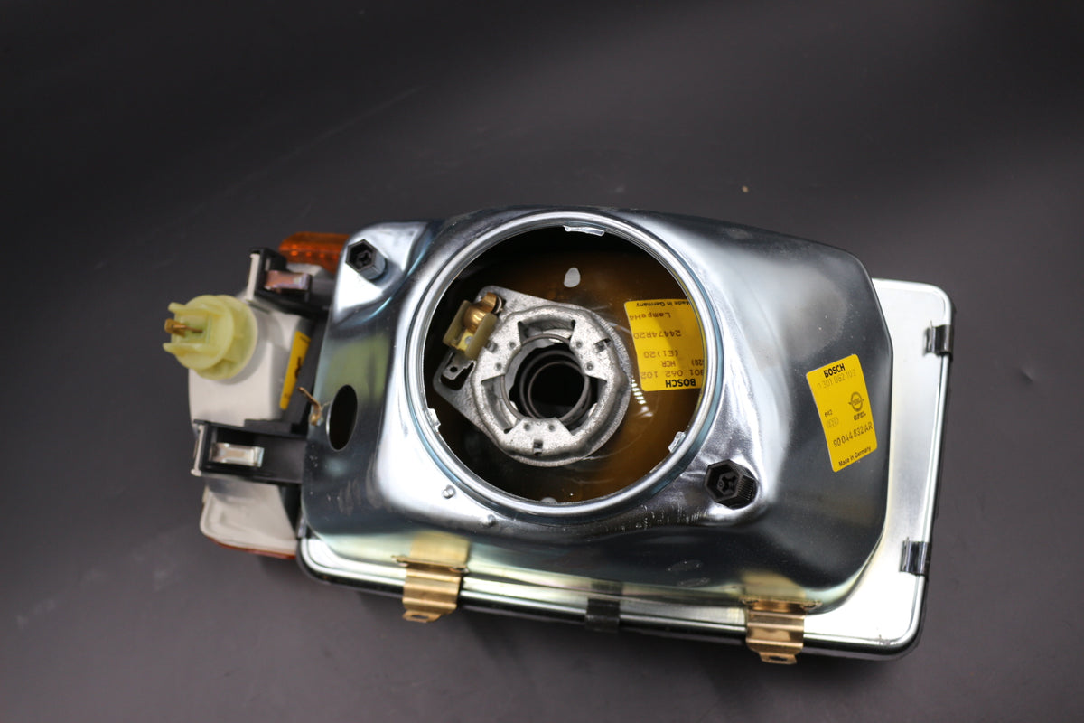 Hauptscheinwerfer rechts H4 Opel Rekord E1 OE 1216242 90044632 Bosch 0301062102